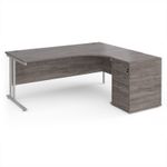 Maestro 25 right hand ergonomic desk 1800mm with silver cantilever frame and desk high pedestal - grey oak
