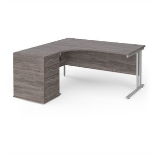 Maestro 25 left hand ergonomic desk 1600mm with silver cantilever frame and desk high pedestal - grey oak