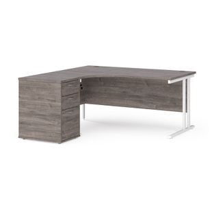 Maestro 25 left hand ergonomic desk 1600mm with white cantilever frame and desk high pedestal - grey oak