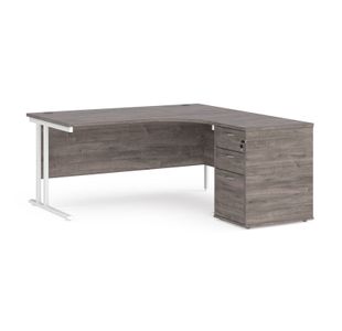 Maestro 25 right hand ergonomic desk 1600mm with white cantilever frame and desk high pedestal - grey oak