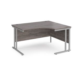 Maestro 25 right hand ergonomic desk 1400mm wide - silver cantilever leg frame, grey oak top
