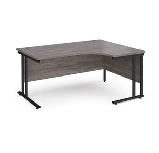 Maestro 25 right hand ergonomic desk 1600mm wide - black cantilever leg frame, grey oak top