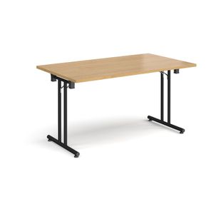 Rectangular folding leg table with black legs and straight foot rails 1400mm x 800mm - oak